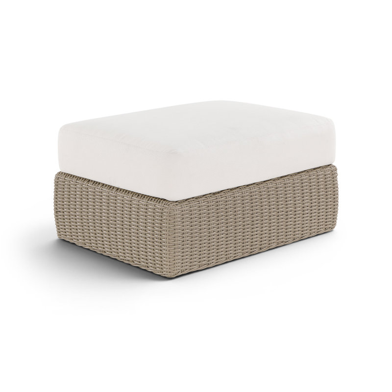 Table basse / repose-pieds de patio en tissu et osier Delmos, Cream