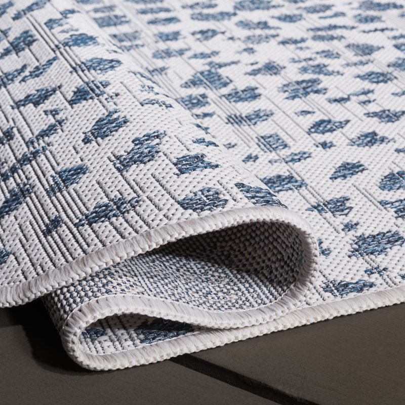 Tapis intérieur / extérieur ivoire / bleu marine Tyron, Rectangle arrondi 5 pi 3 po x 7 pi 7 po