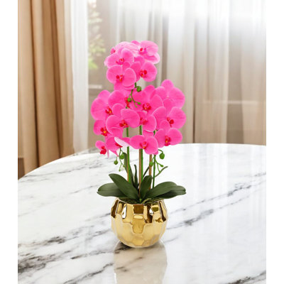 Orchidée rose 26 po dans un vase rond martelé