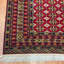 Tapis afghan en laine noué à la main