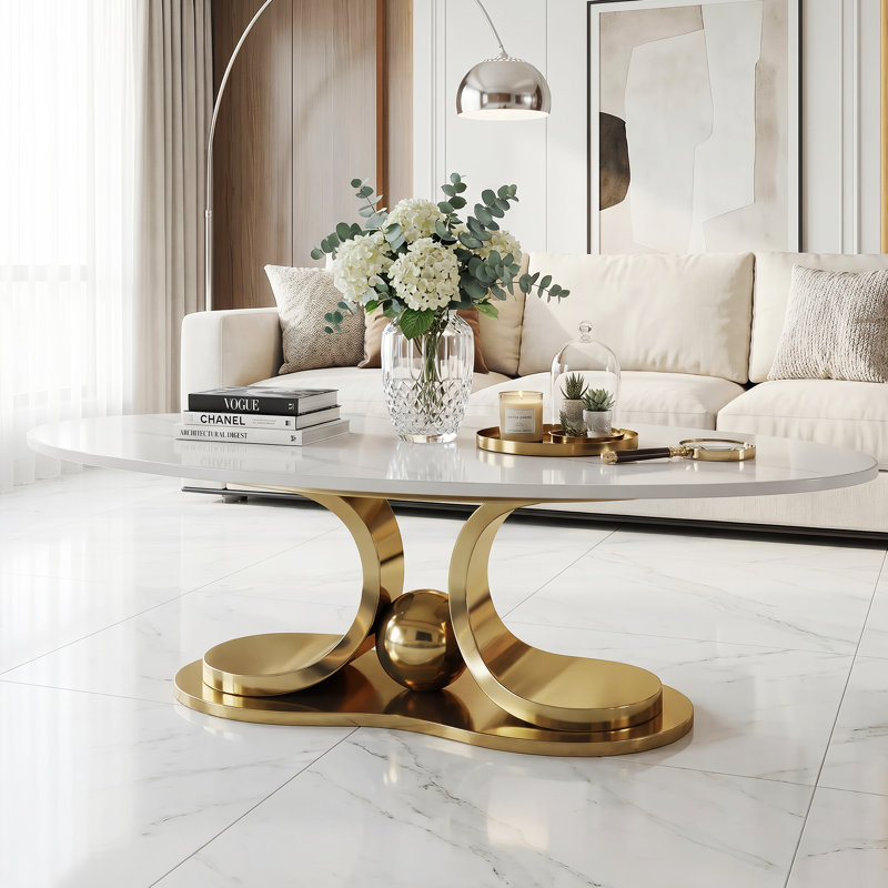 Table basse de luxe moderne de 49,2 po avec plateau en pierre frittée et base sculpturale dorée, table centrale ovale pour le salon