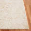 Tapis floral en laine et en coton touffeté à la main Larramore doré / ivoire-411723069