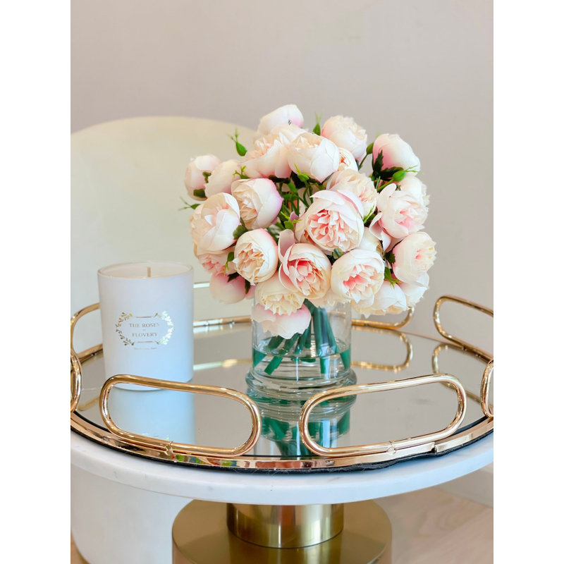 Arrangement floral rose dans un vase, Champagne