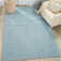 Tapis bleu ciel en laine tissé à la main