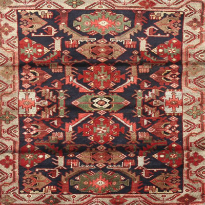 Tapis géométrique rouge / beige / noir