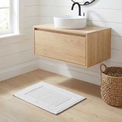 Sanctuary White 100% Cotton Solid Woven 17x24'' Bath Rug