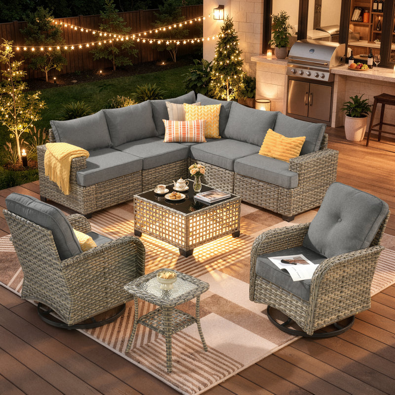 Ensemble de conversation modulaire en rotin avec coussins Wahkon pour 7 personnes avec table basse éclairée et chaises pivotantes