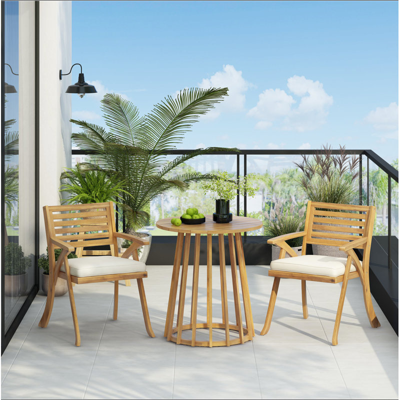 Ensemble repas d'extérieur en bois d'acacia avec coussins 3 pièces