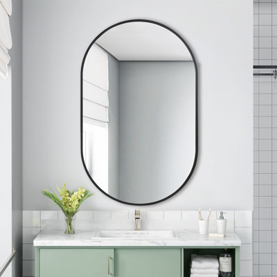 Miroir mural ovale en métal