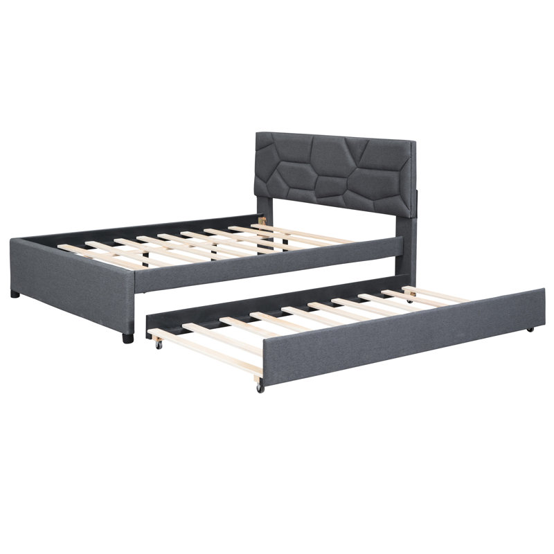 Lit plateforme tapissier avec tête de lit à motif brique et lit gigogne simple en lin gris pour une chambre à coucher moderne