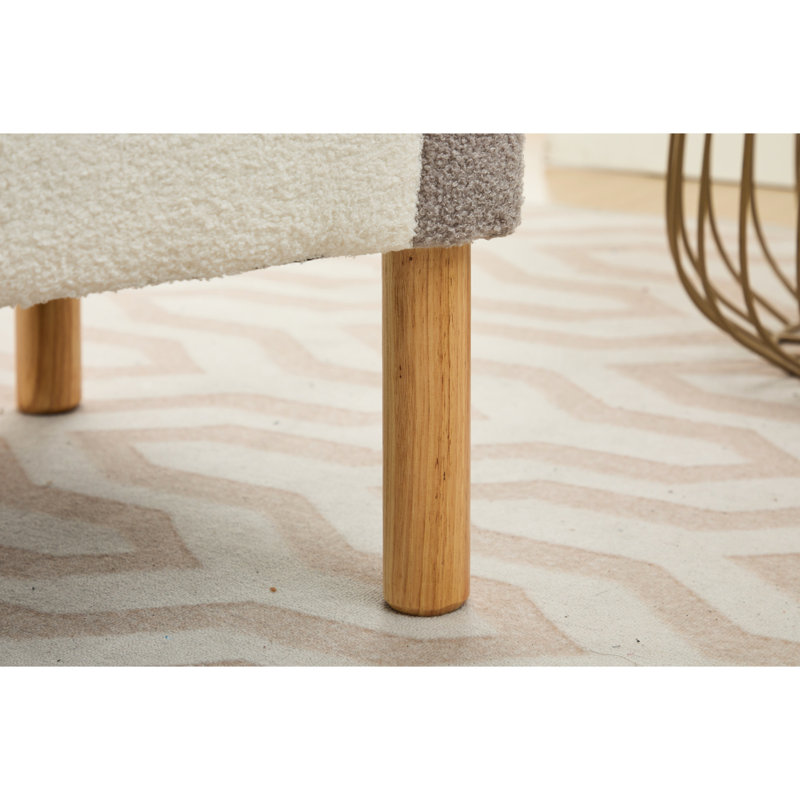 Fauteuil arc-en-ciel avec pieds en bois massif et assise moelleuse