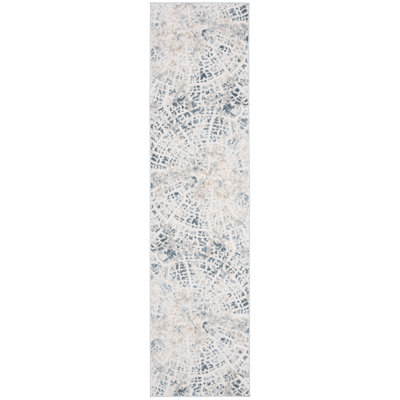 Cream/Teal Area Rug