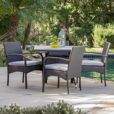Mathiatis Square 4 - Person 37" Long Dining Set with Cushions by Bay Isle Home