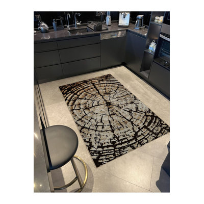 Tapis beige lavable à la machine