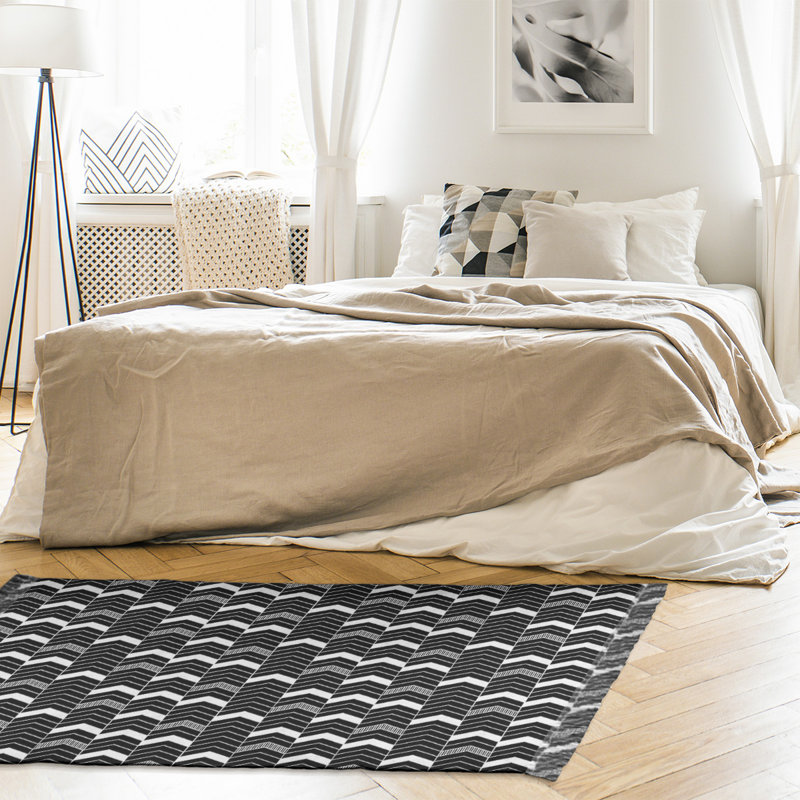 Tapis noir à chevrons, Non