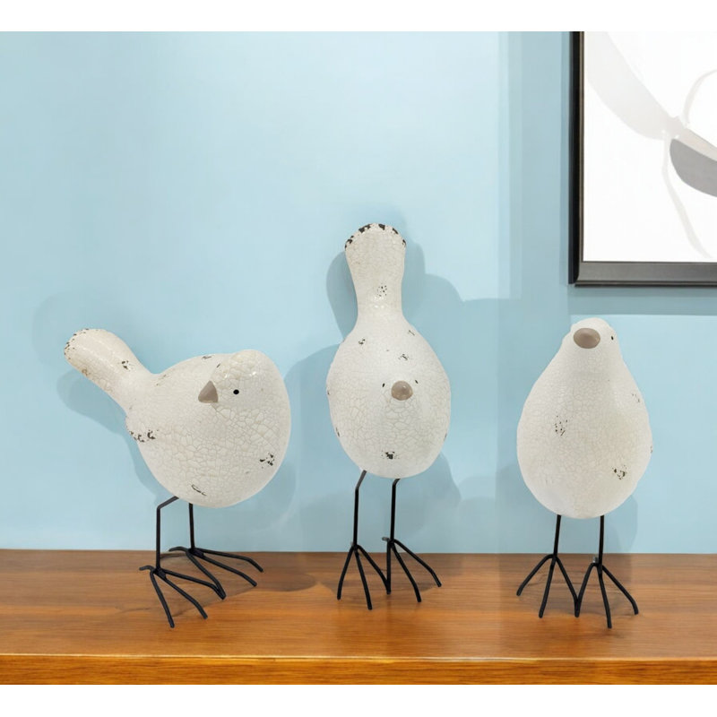 Ensemble de trois statues d'oiseaux en tissu noir et blanc