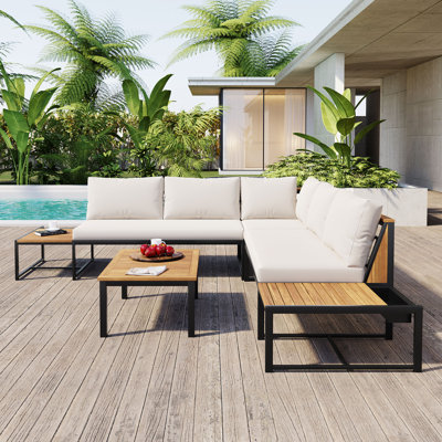 Ensemble de conversation pour l'extérieur 4 pièces avec table basse