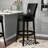 Alesja Swivel Counter or Bar Height Armless Bar Stool with Footrest in Faux Leather and Black Wood-17752755-41670666