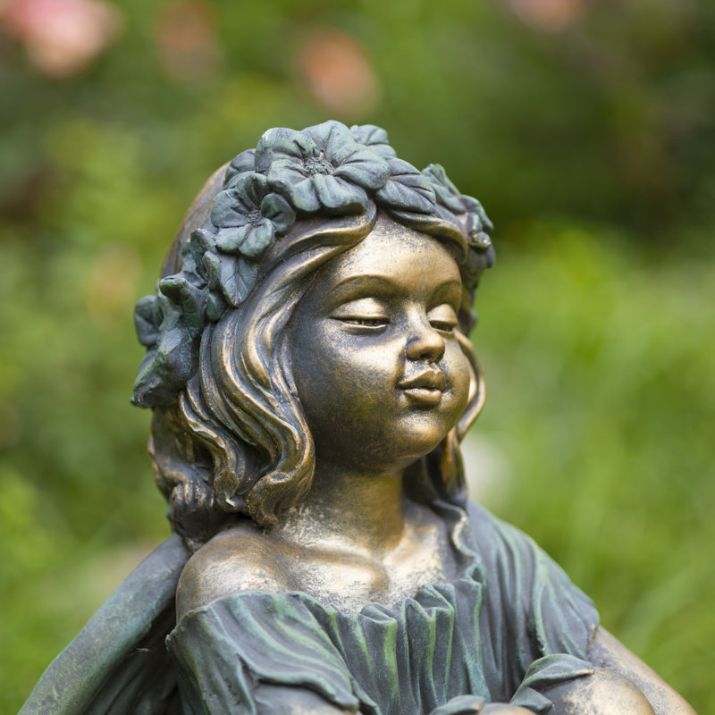 Statue de jardin fée en magnésium assise