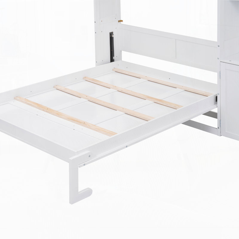 Lit escamotable avec plusieurs tablettes de rangement et une armoire