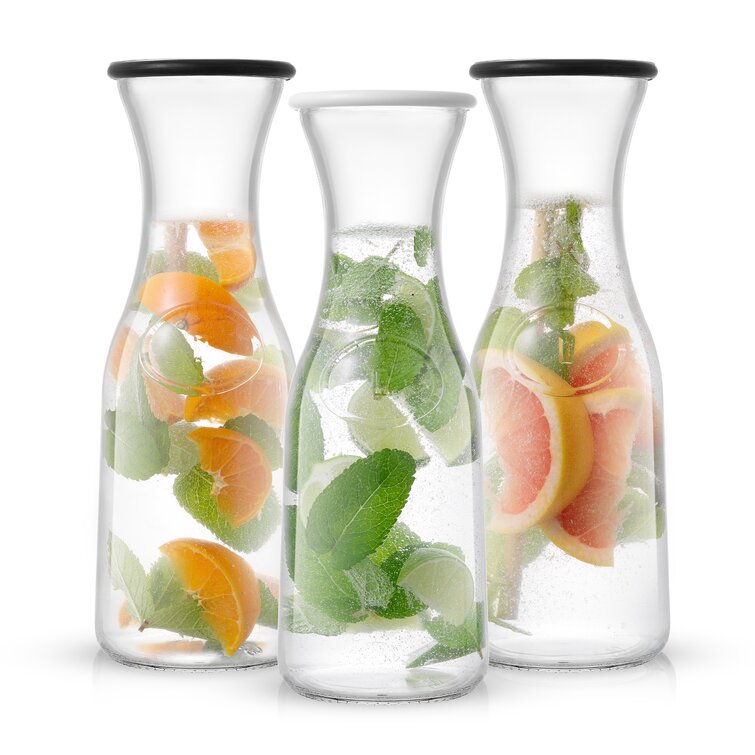 35 oz. Clear Large Disposable Plastic Wine Carafes with Lids (12 Carafes),  12 Carafes - Foods Co.