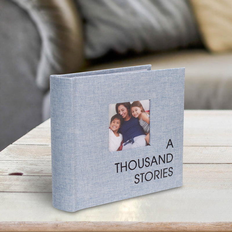Album bleu 1-UP Thousand Stories