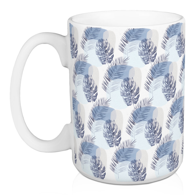 Grande tasse bleue à motif de feuilles tropicales