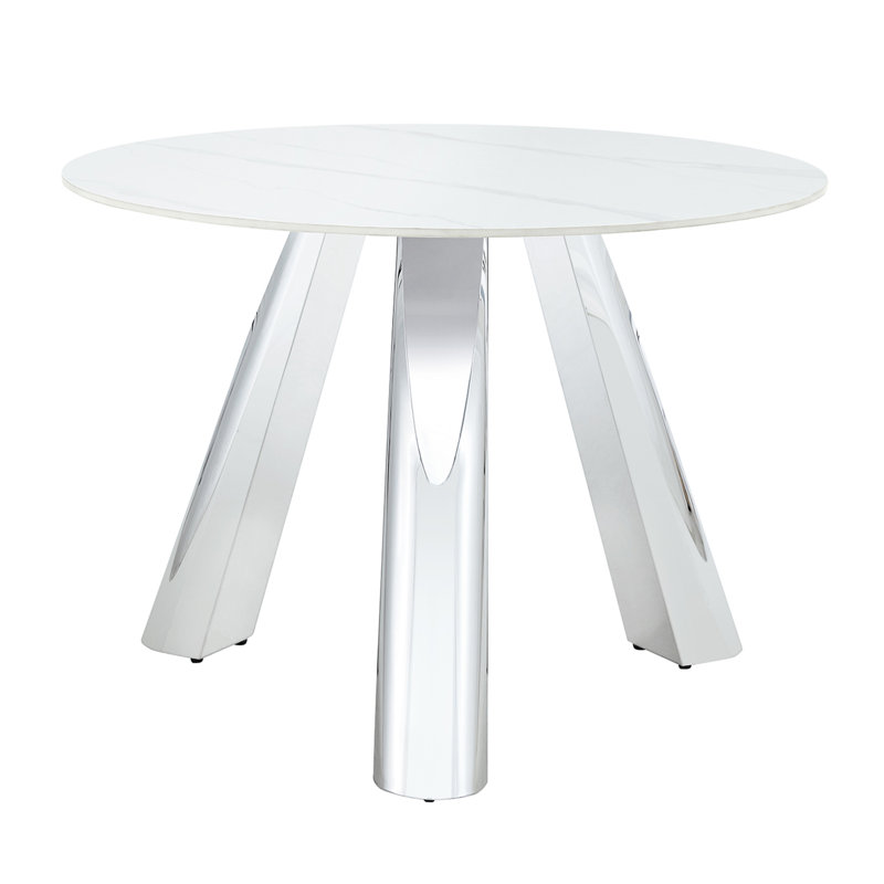 Une table ronde à pieds en acier inoxydable de 42 pouces avec un plateau en marbre convient à une utilisation par 4 à 6 personnes