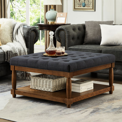 Grand repose-pieds de couleur gris anthracite, tissu d'ameublement en lin, avec design et tablette de coussin de table basse carrée en bois massif