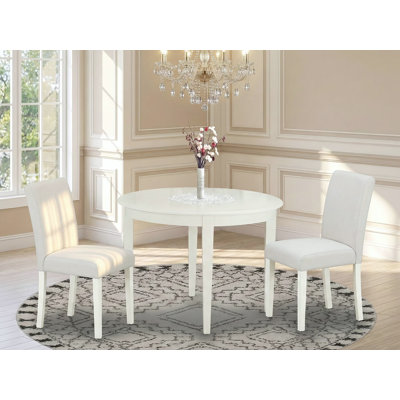 L'ensemble de salle à manger 3 pièces comprend une table de cuisine ronde et 2 chaises de salle à manger Parson en similicuir blanc, 42 x 42 pouces, lin blanc