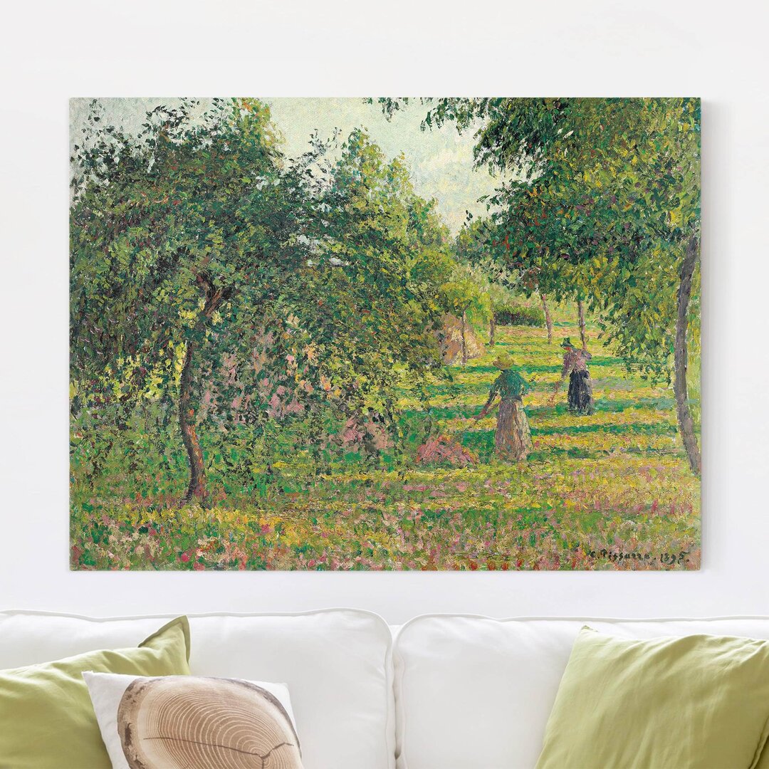 Leinwandbild Apfelbäume und Heuwender in Eragny von Camille Pissarro