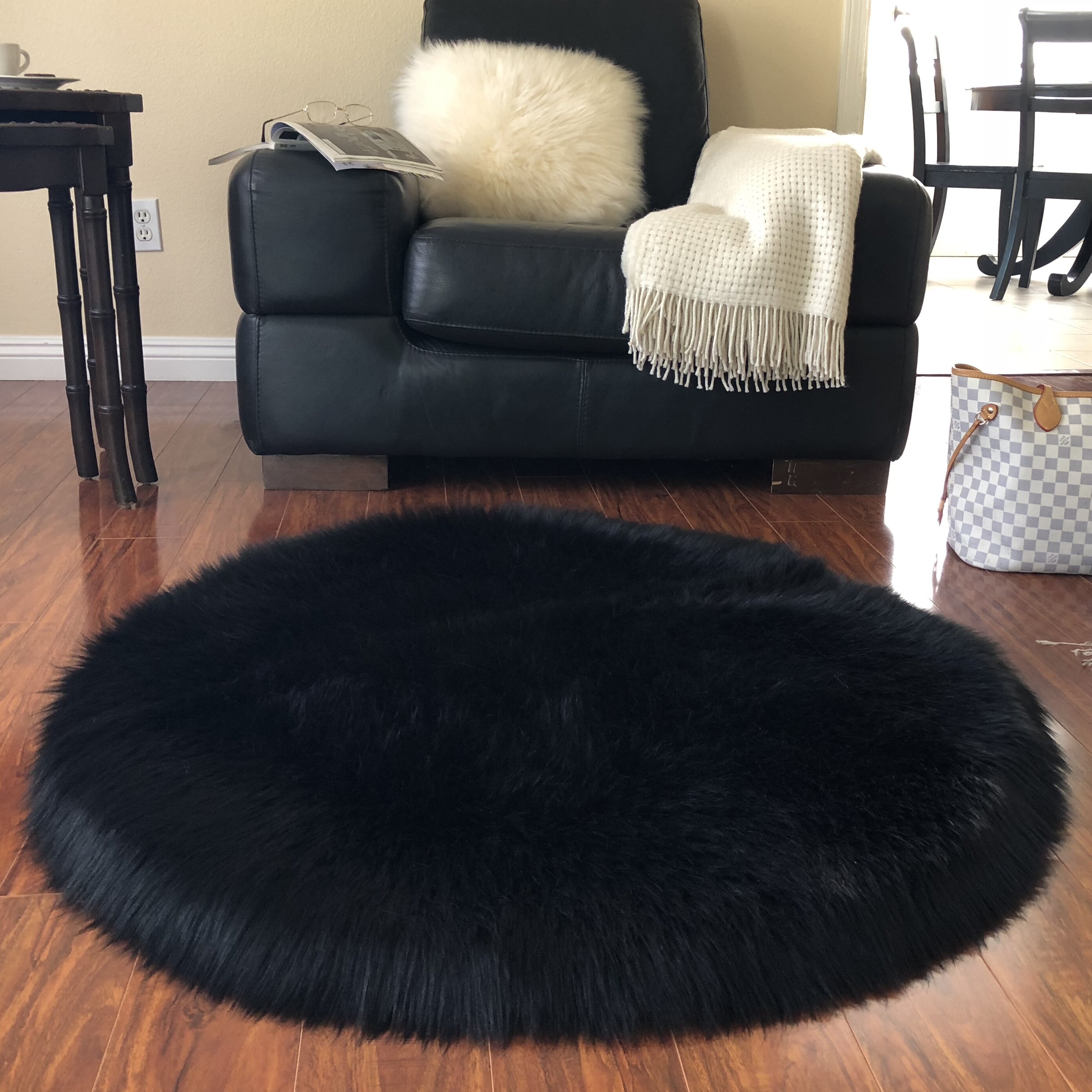 Sheepskin store black rug