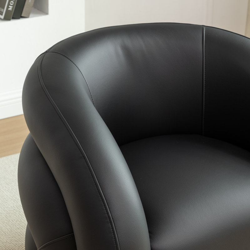 Fauteuil demi-tonneau pivotant en cuir artificiel Coyle, Noir
