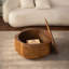Table basse en rotin en forme de fleur avec couvercle de rangement amovible, style bohème chic, parfaite pour les salons douillets et les petits espaces.