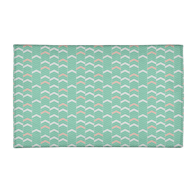 Tapis rouge pâle/rose à chevrons