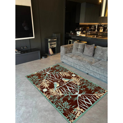 Tapis intérieur / extérieur en polypropylène tissé à la machine Deondrick