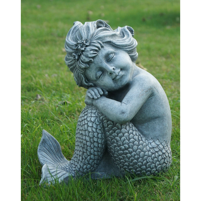 Statue sirène assise