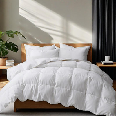 Couette en duvet d'oie blanche toute l'année