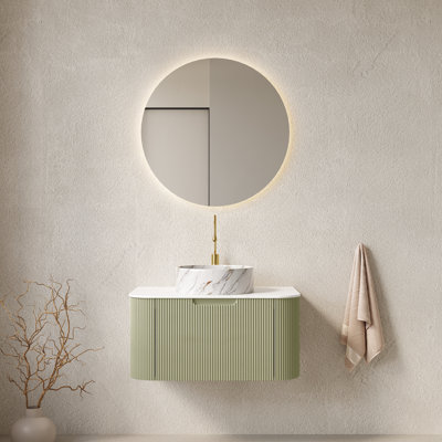 Ensemble de meuble-lavabo moderne peu encombrant, armoire rayée vert clair, plateau en marbre