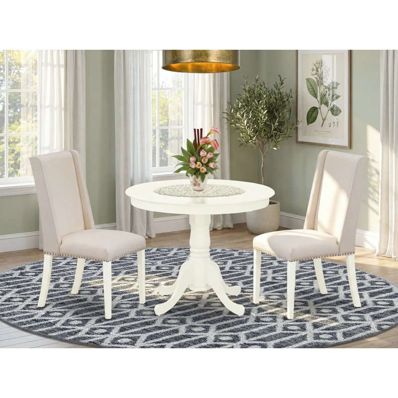 L'ensemble de meubles de salle à manger 3 pièces comprend une table de cuisine ronde avec piédestal et 2 chaises de salle à manger Parson en lin crème, blanc lin