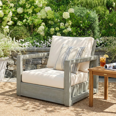 Chaise de patio en bois d'acacia avec coussins Donnie