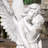 Angel Hugging Child Statue