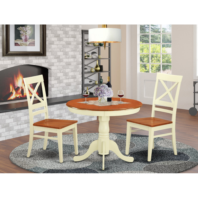 L'ensemble de salle à manger 3 pièces comprend une table de salle à manger ronde avec piédestal et 2 chaises en bois, babeurre 36 po x 36 po