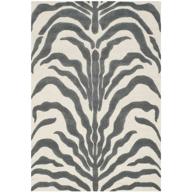 Carevelle Animal Print Wool Hand Woven Area Rug