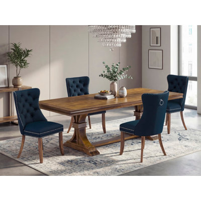 Cet ensemble de salle à manger moderne 5 pièces comprend une table de cuisine rectangulaire et 4 chaises de salle à manger en tissu de polyester bleu marine, noyer antique