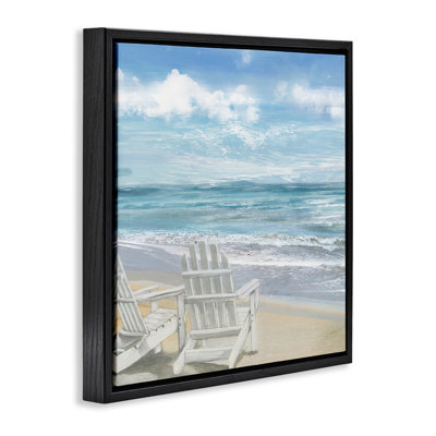 Chaises Adirondack blanches sur la plage