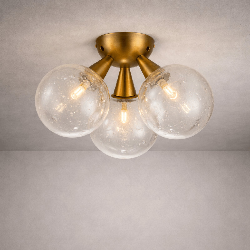 Orbit 3-Globe Aged Brass Semi-Flushmount