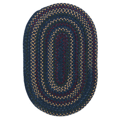 Tapis bleu tressé à motif géométrique Shyla