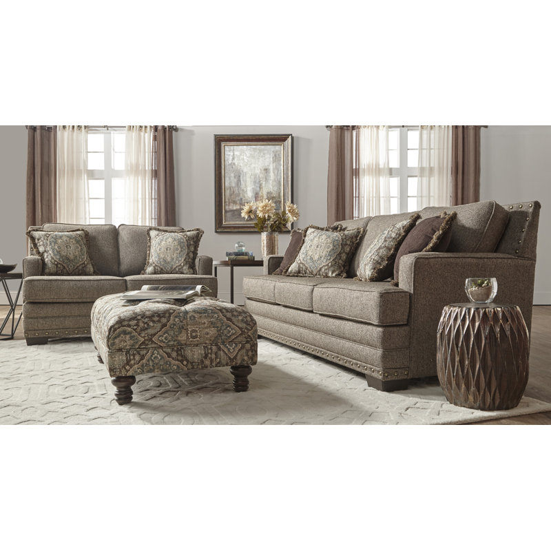 Anshuman Upholstered Ottoman, Tapestry Ocean Cliff