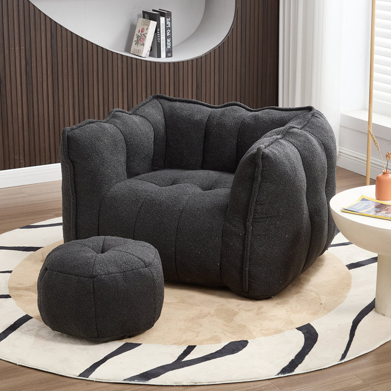 Fauteuil à billes avec repose-pieds Lazy, Chenille noir